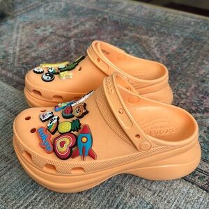 Used Crocs Bae size 8 in Orangesicle with Jibbitz